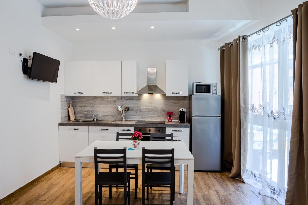 Апартаменты Ichnos Loft 55 Ольбия Экстерьер фото